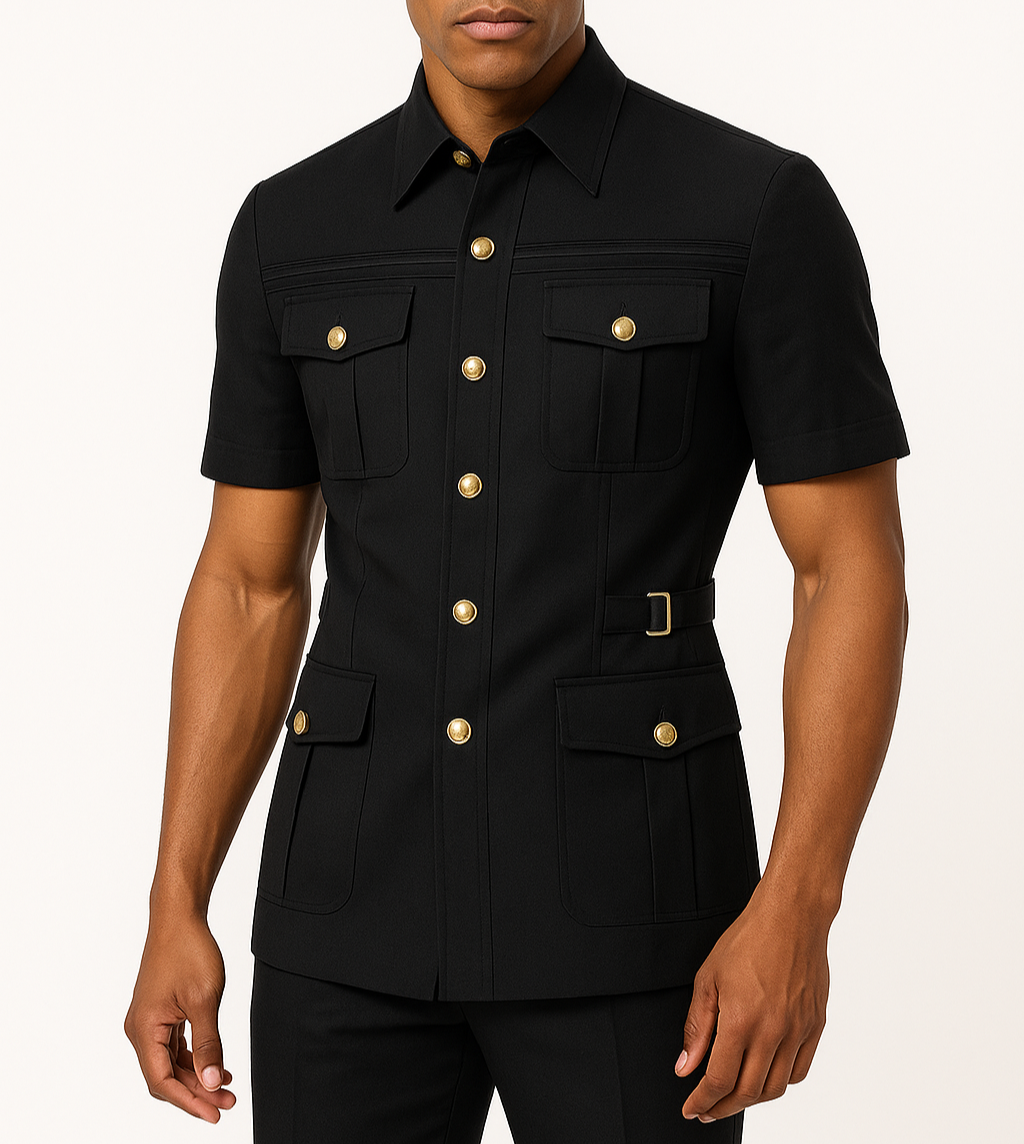 Man wearing a black short-sleeve shirt with gold buttons on a white background