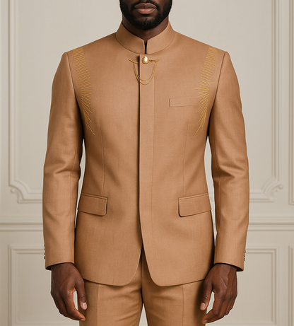 Man wearing a tan suit against a neutral background